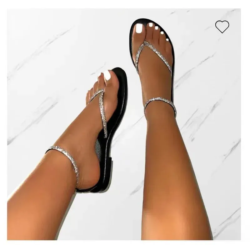 Flat sandals with gold details