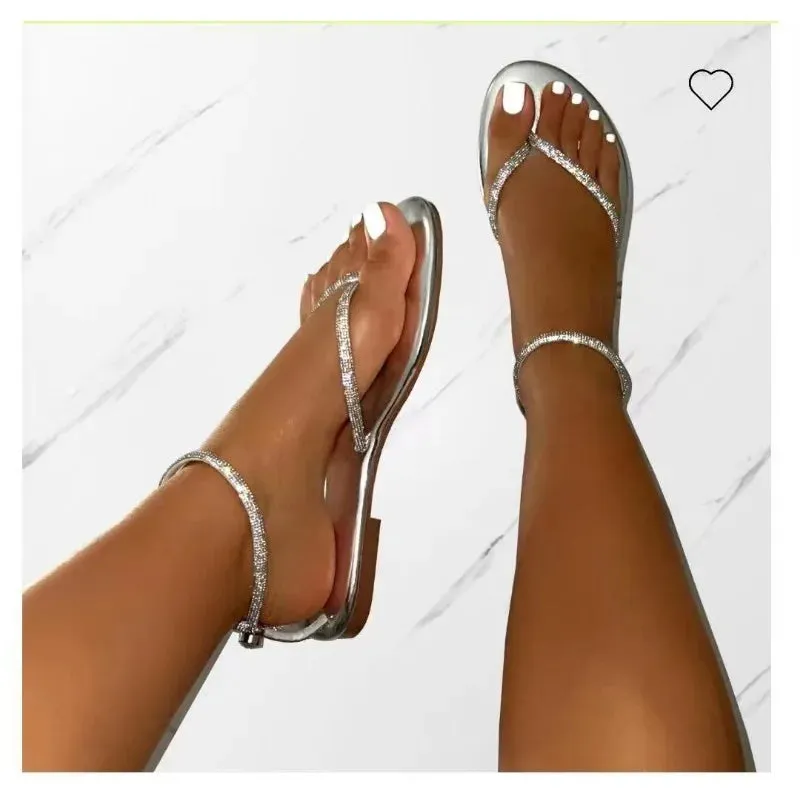 Flat sandals with gold details